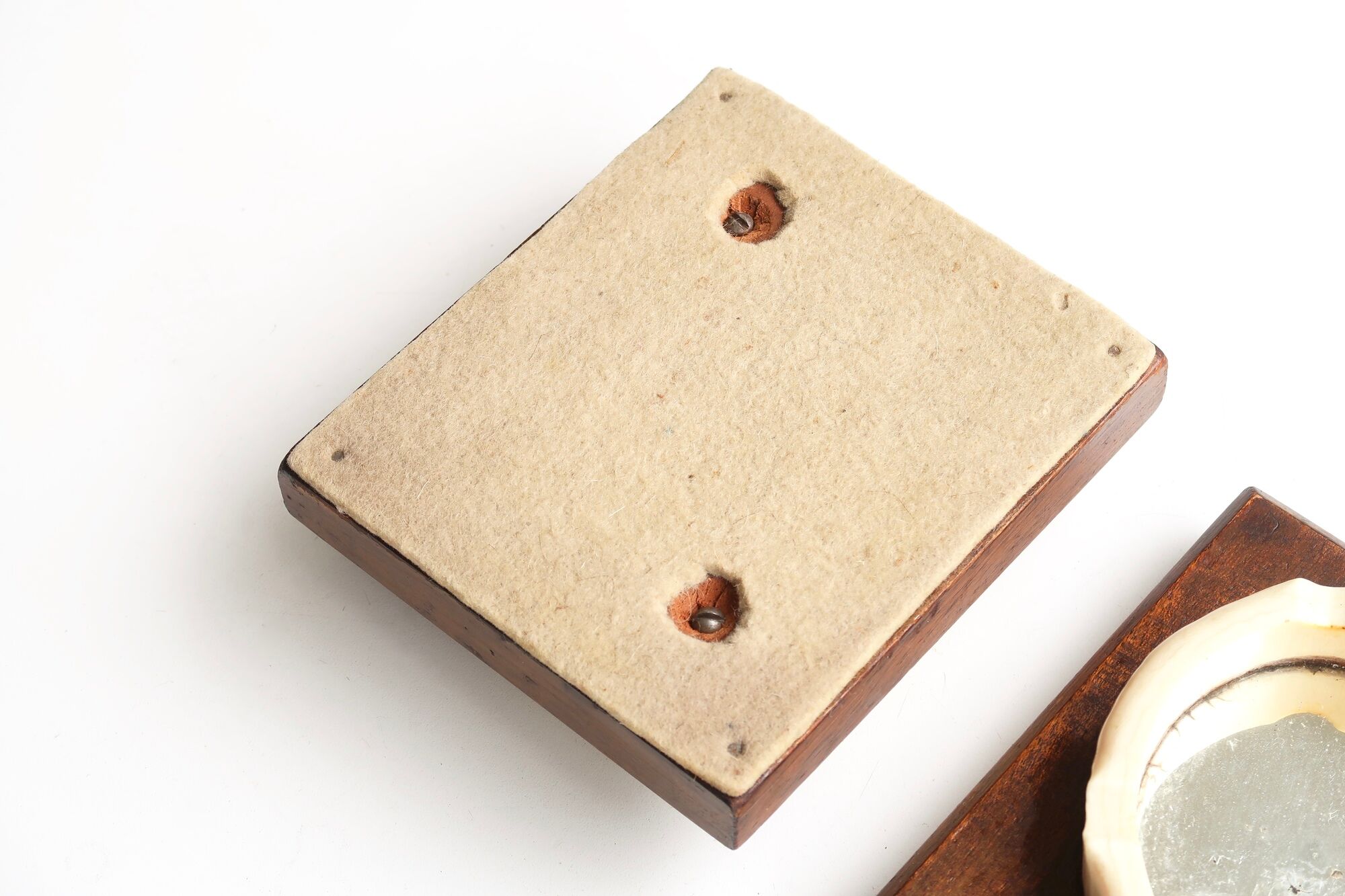 Pair of wooden and bakelite ashtrays with mirrored backs from the 1930s