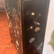 Magnificent black and gold lacquered Chinese cabinet.