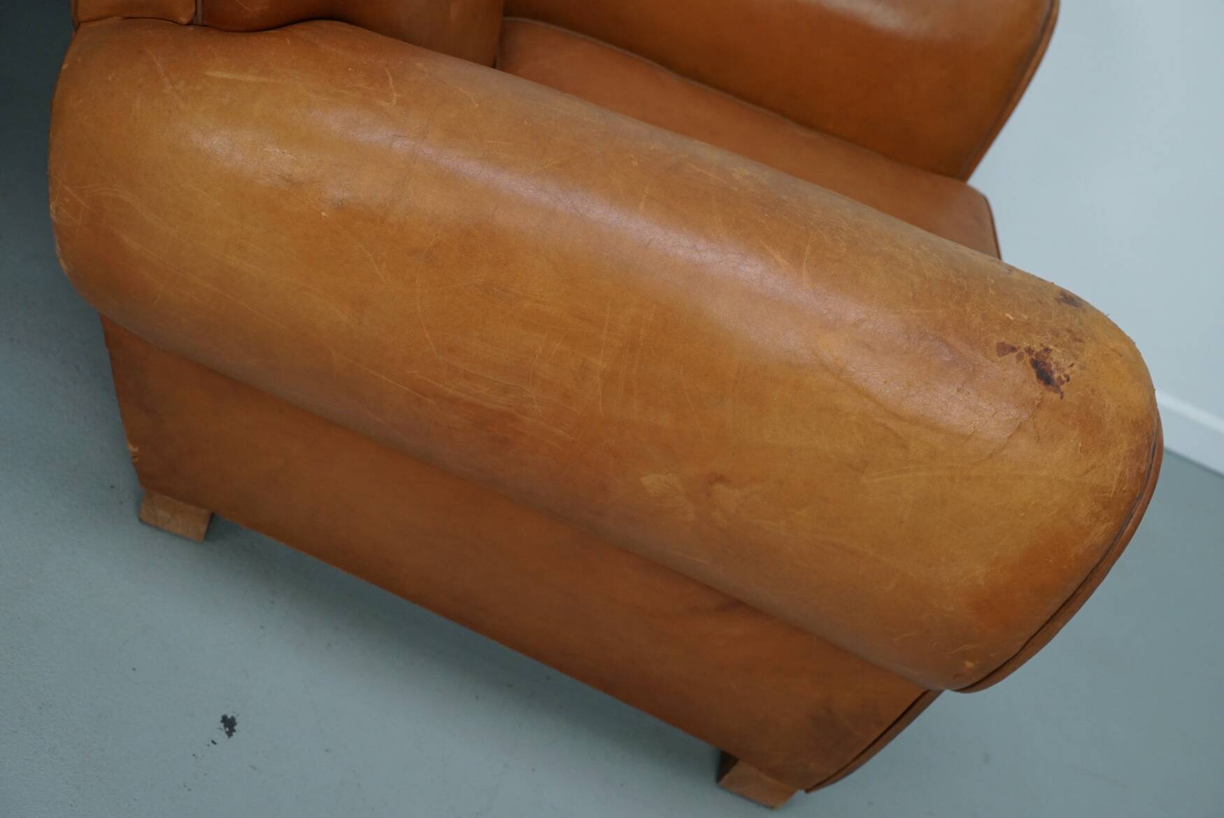 Pair of French club chairs with moustache back in cognac leather, 1950s