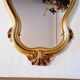 Miroir mural et console dorés de style baroque