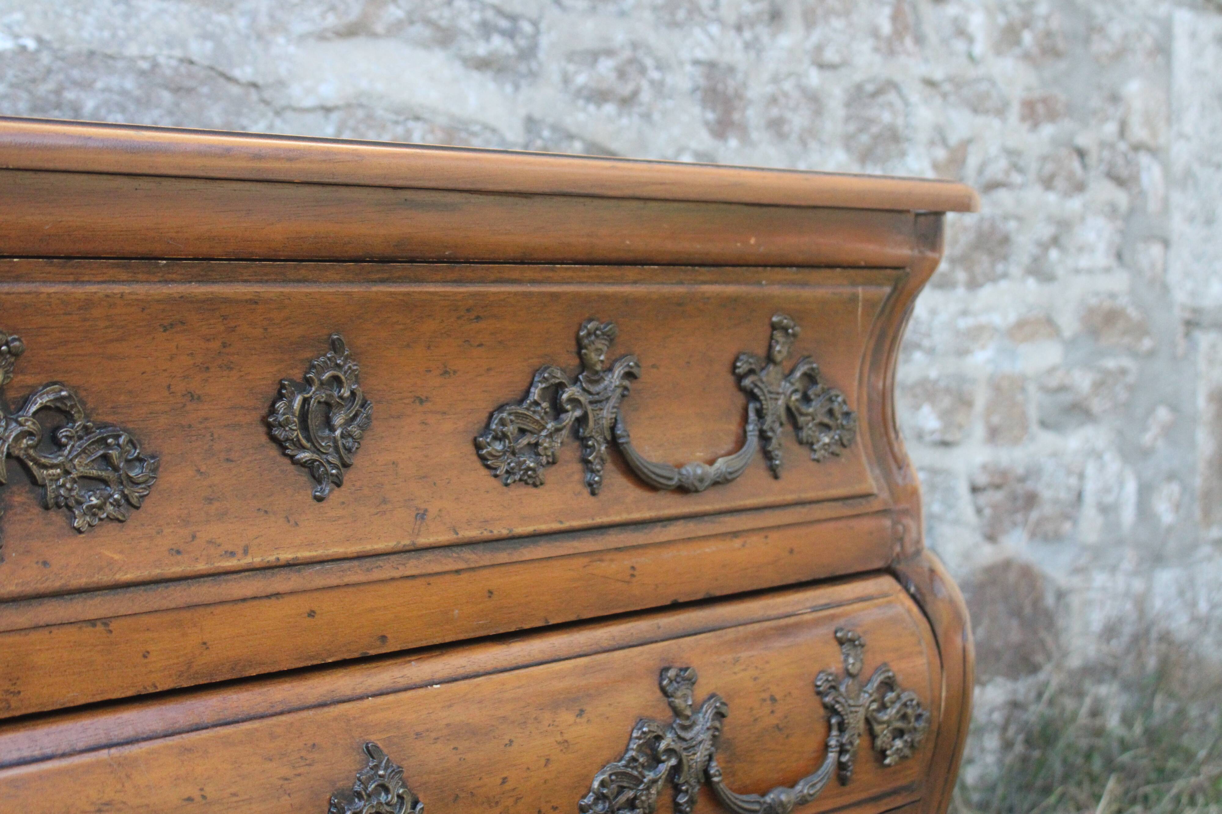 Curved Louis XV style chest of drawers known as a “tomb”