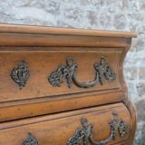 Curved Louis XV style chest of drawers known as a “tomb”