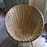 Antique round rattan armchair