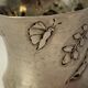 Art Nouveau round silver towel decoration of flowers around 1900