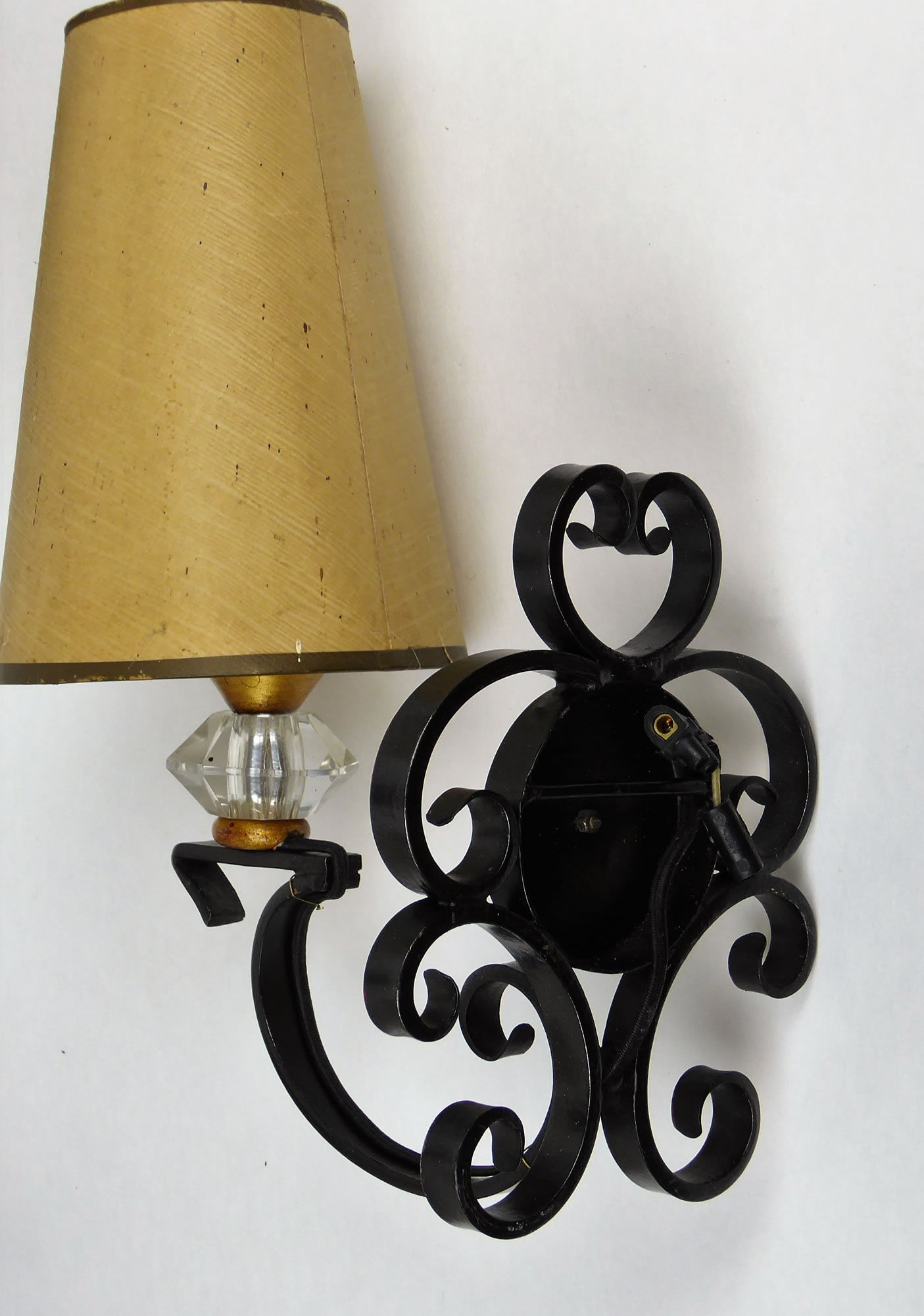 1950 gold star and black metal sconces