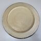 Round ceramic plate with hand-painted decoration