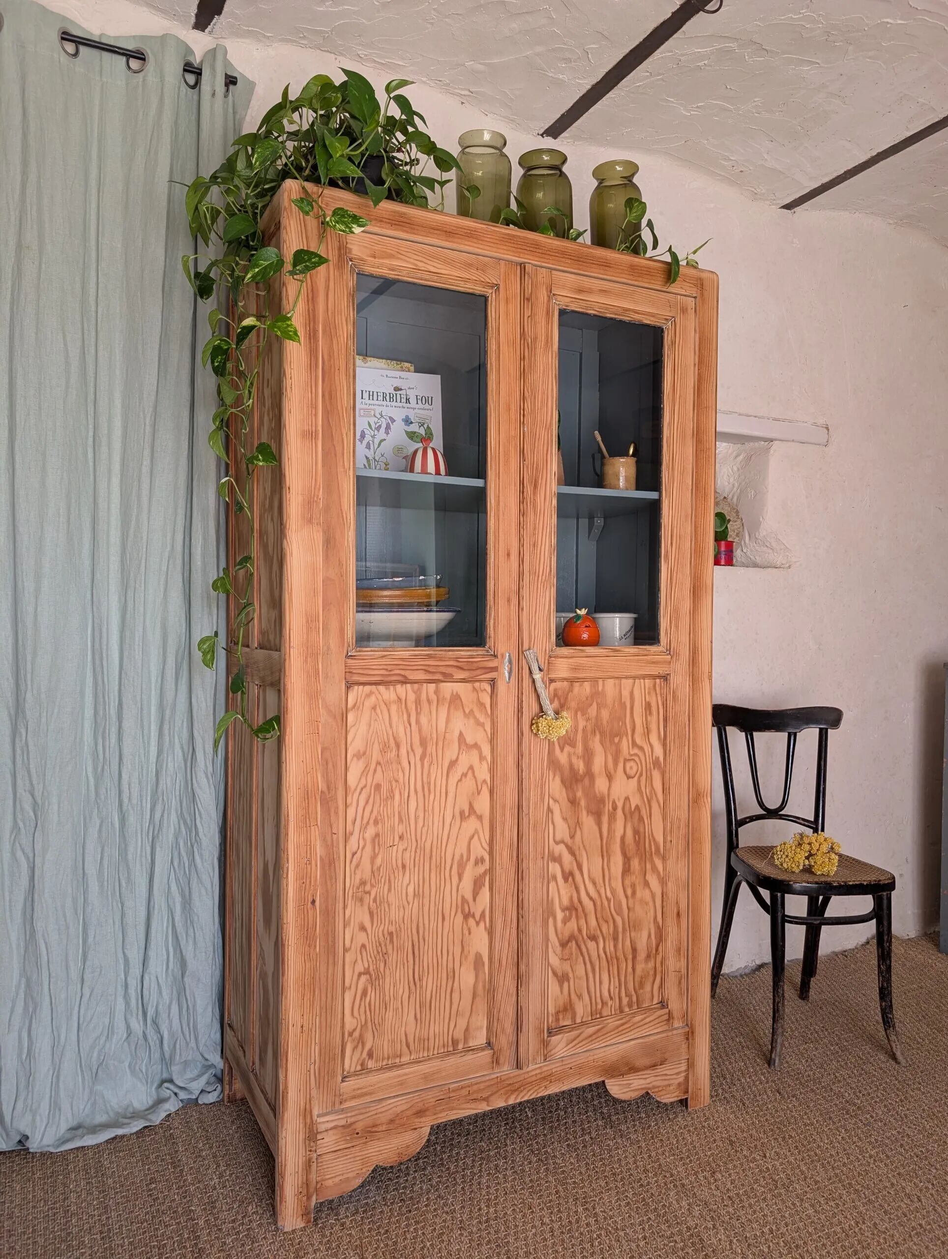 Old glass-fronted wooden library – blue interior
