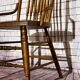 Wooden armchair with high back