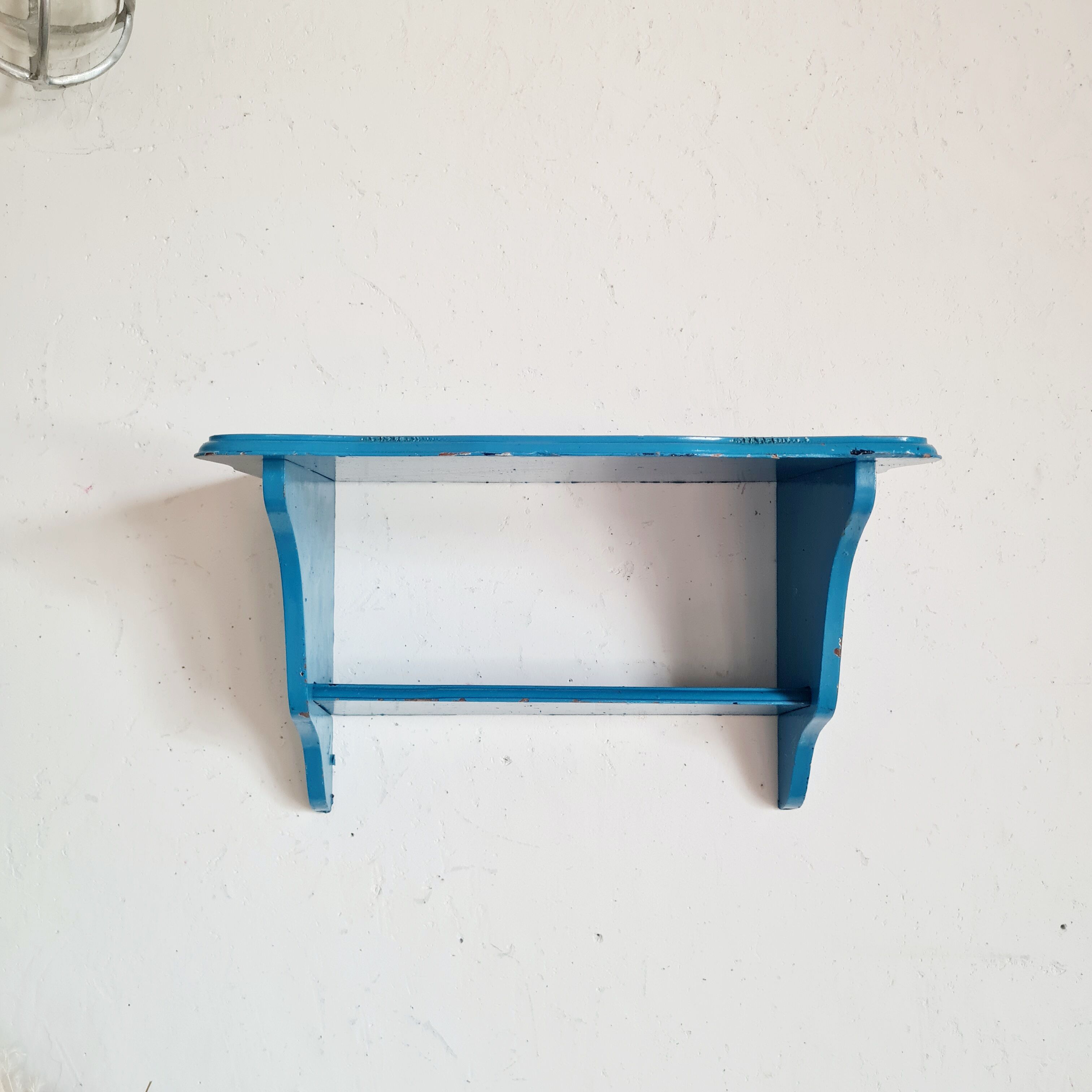 Blue wood wall shelf