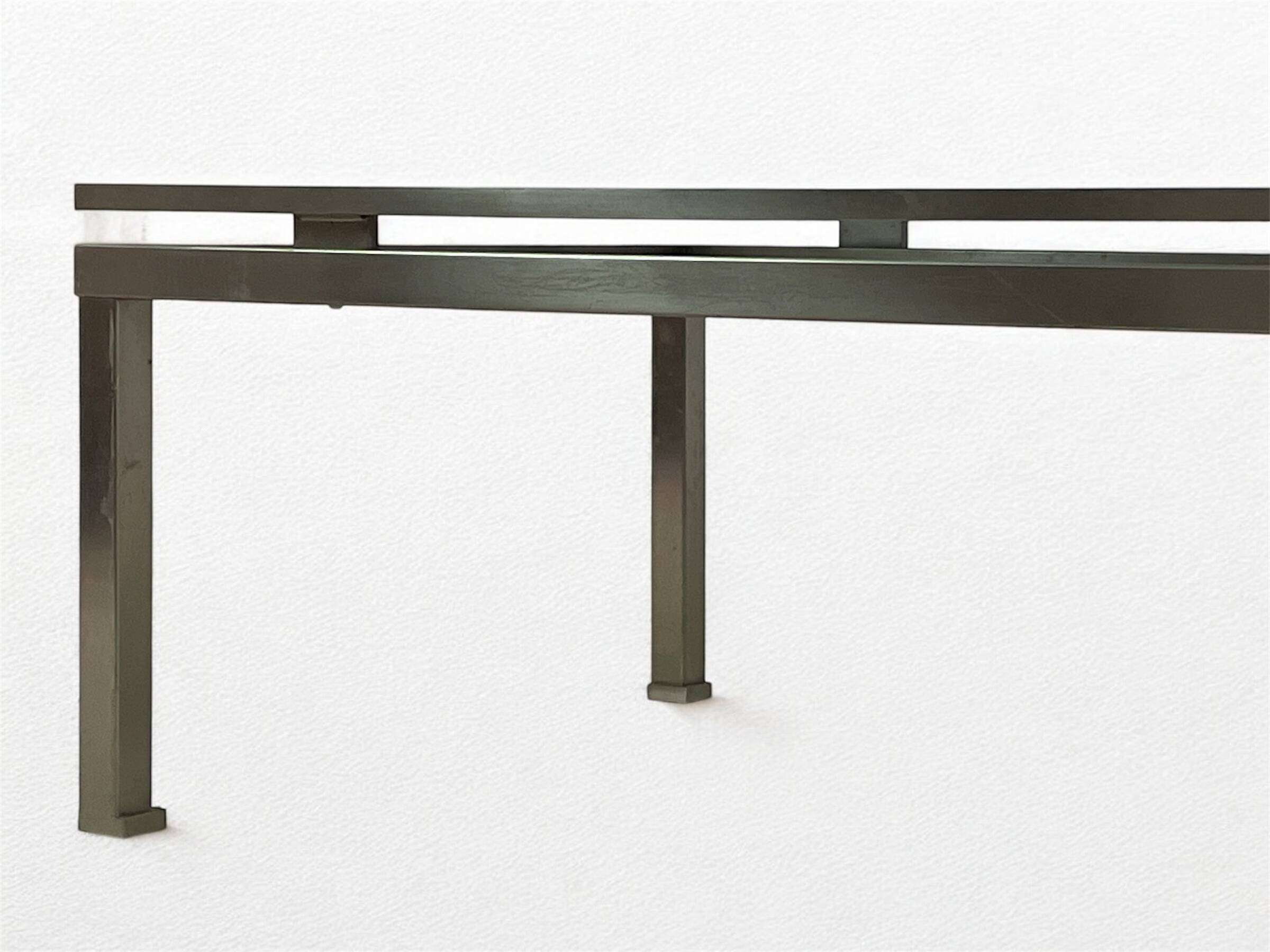 Brass coffee table with smoked glass top by Guy Lefevre, 1970s