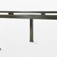 Brass coffee table with smoked glass top by Guy Lefevre, 1970s