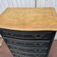 Louis XV style chest of drawers, black patina.