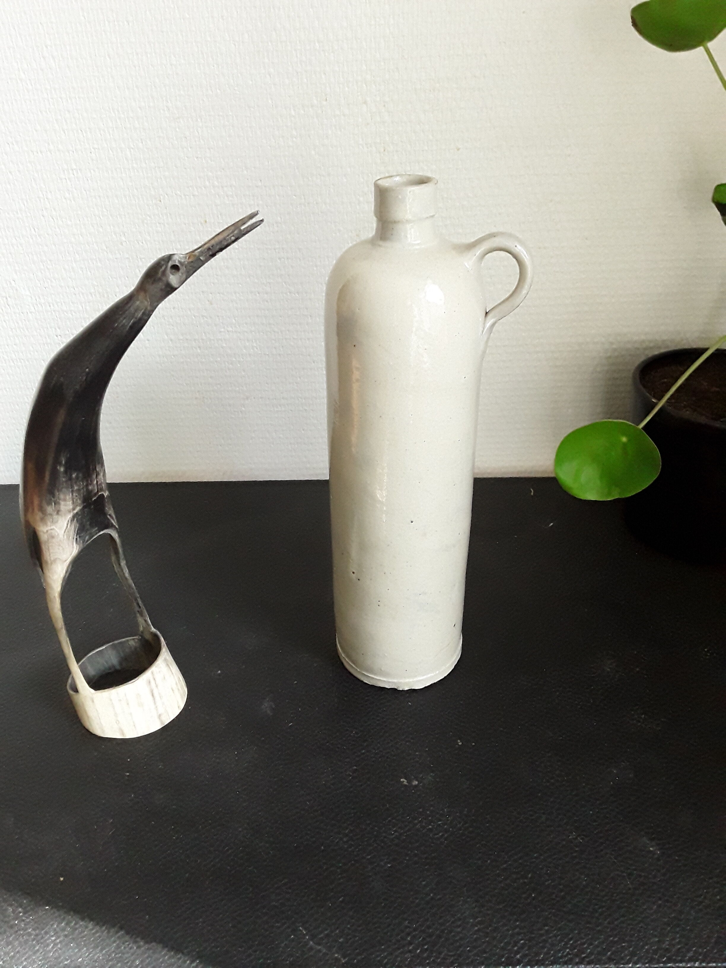 Vintage glazed stoneware bottle with handle