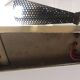 Wall lamp with reflector in rigitulle (perforated metal) from the 50s