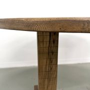Oval table with T-shaped legs, solid oak, student woodworking project.