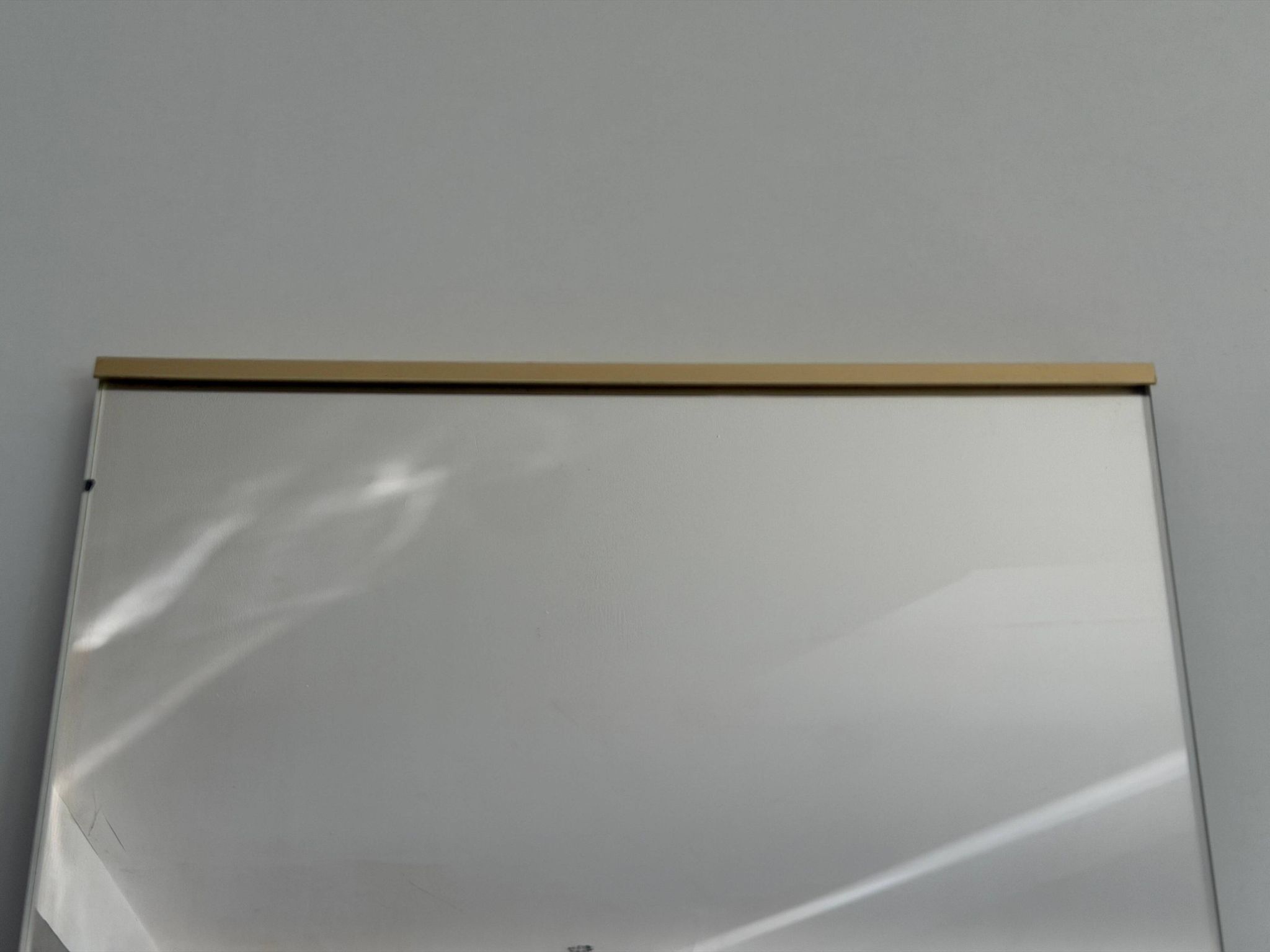 Minimalist rectangular wall mirror with a brass frame, 1960s, Germany