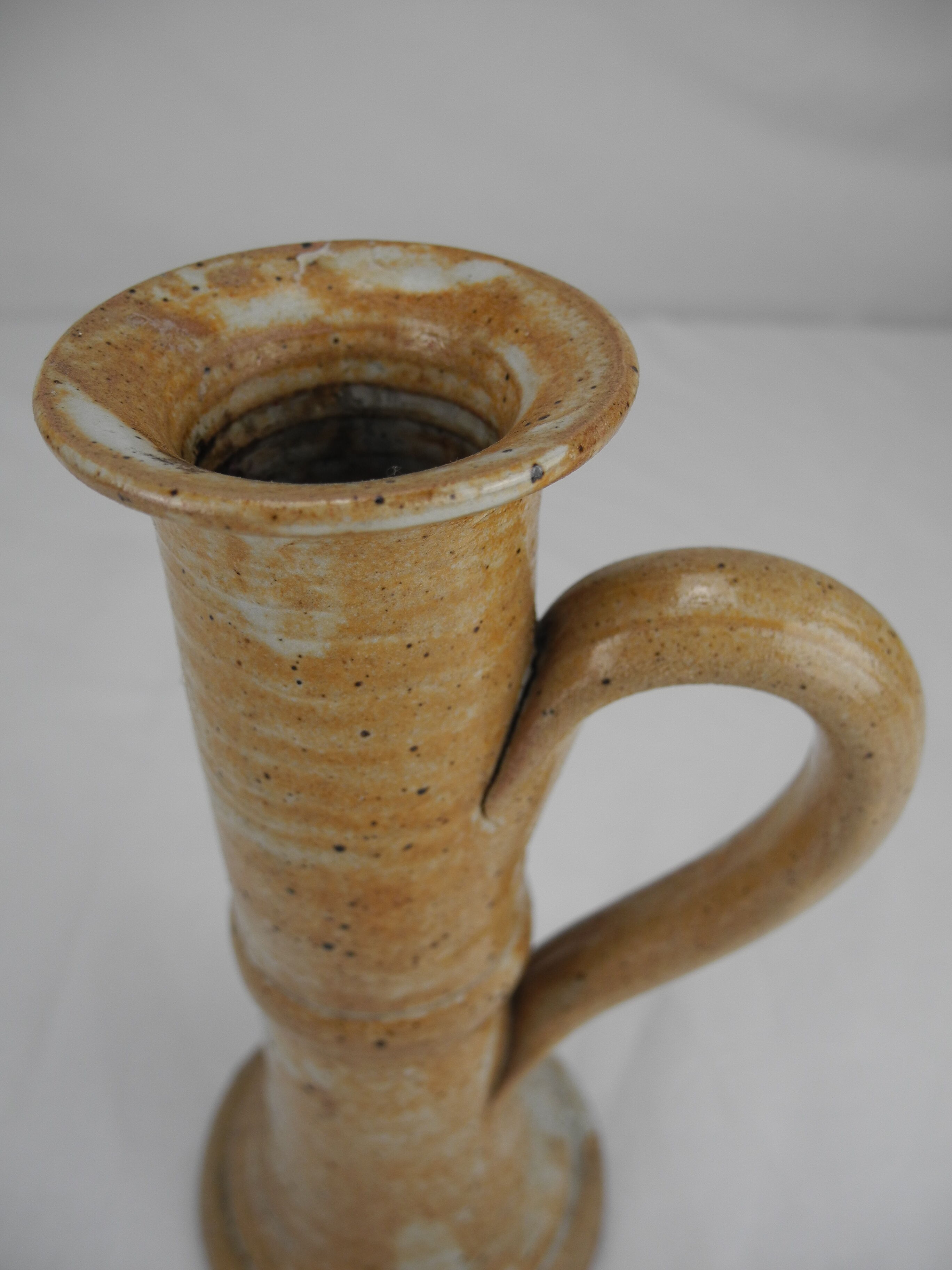 Old vintage stoneware candle holder