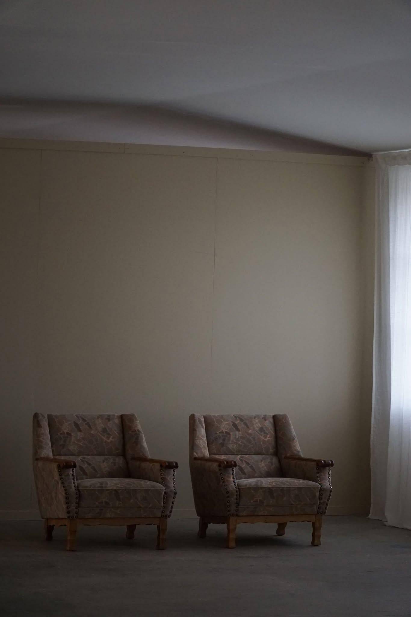 Mid-century modern Danish, pair of oak armchairs with original fabric, 1960s.