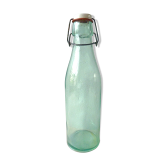 Glass bottle with ceramic cap from the 50s