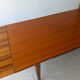 Rectangular extendable table in Scandinavian design made of solid teak.
