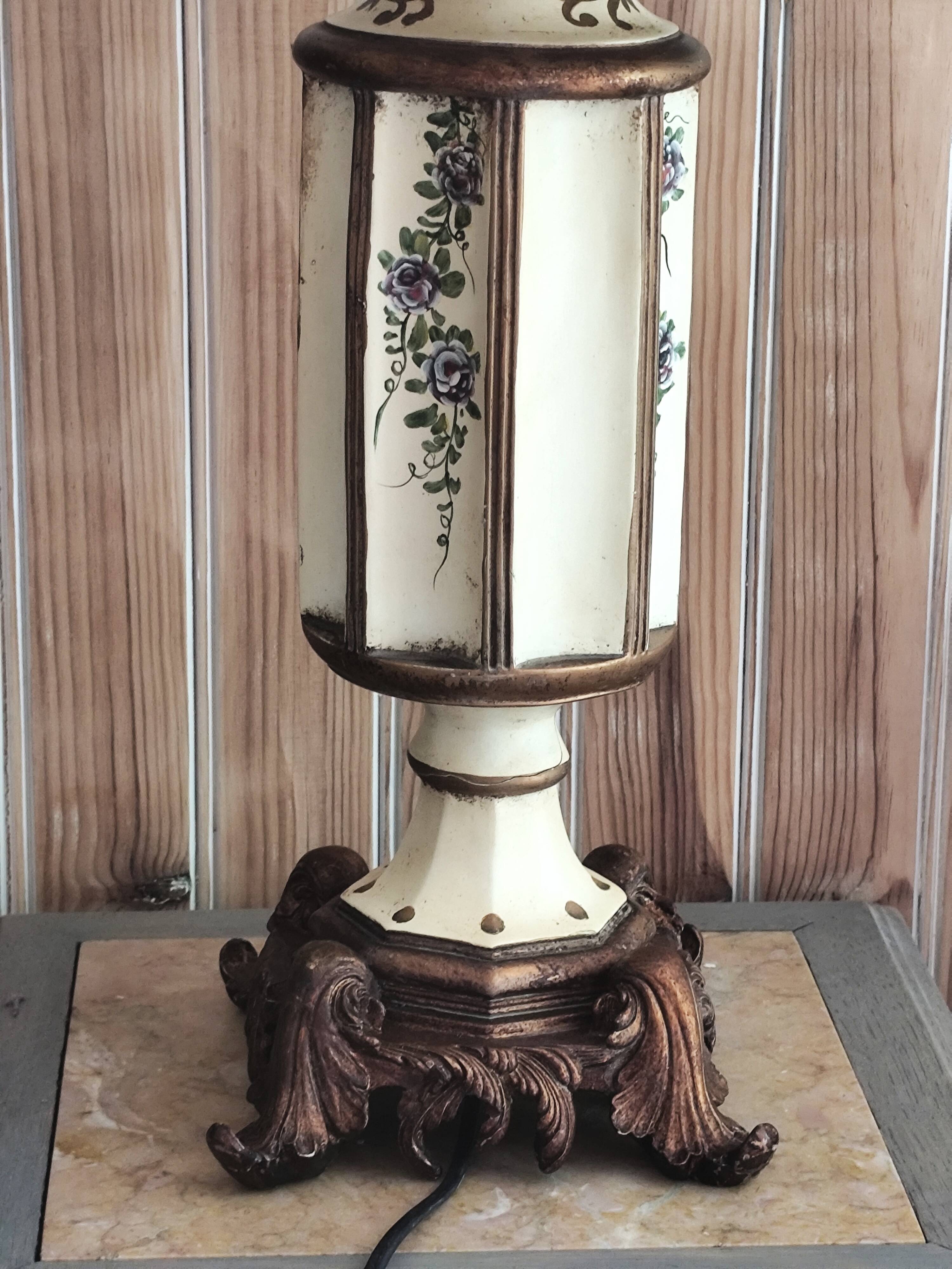 Large pagoda lamp painted with floral patterns and metal shade.