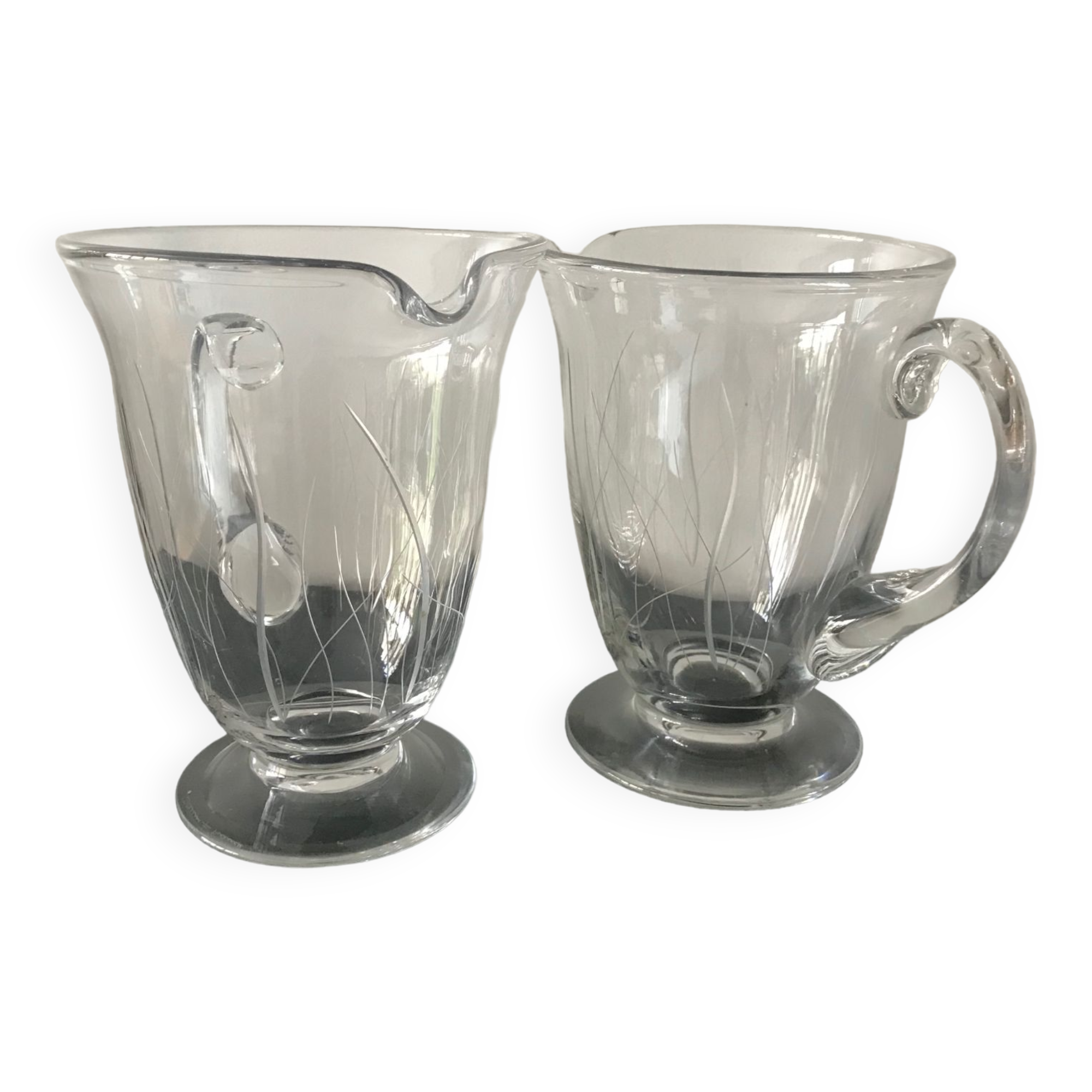 Pair of daum pitchers