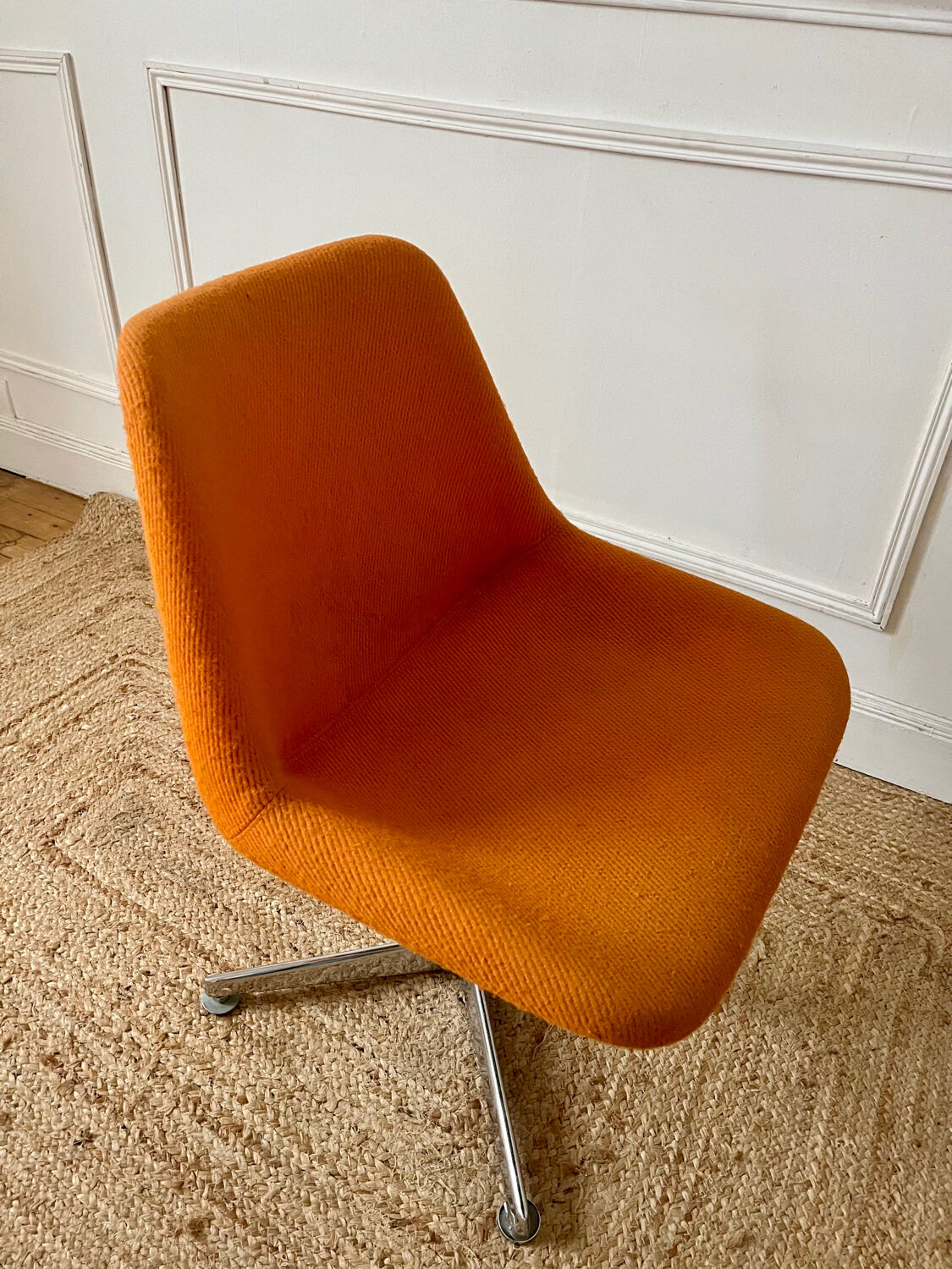 Chrome metal chair with orange fabric from the 70s.