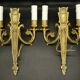 Pair of wall sconces, quiver and eagle heads, Louis XVI style - gilded bronze