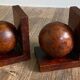 Pair of bookends adorned with spheres