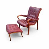 Scandinavian armchair with footrest