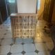 Small Provençal jump commode in light wood in Louis XV style.
