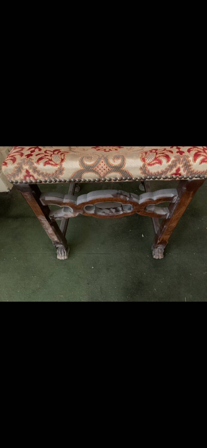 Antique wooden chair with upholstery