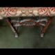 Antique wooden chair with upholstery