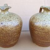 Pair of small antique stoneware oil jars