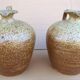 Pair of small antique stoneware oil jars