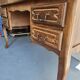 Antique wooden desk with 4 drawers.