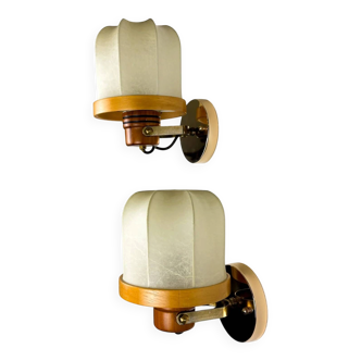Pair of articulated "Cocoon" wall lights, resin and pine, Italy, circa 1970s
