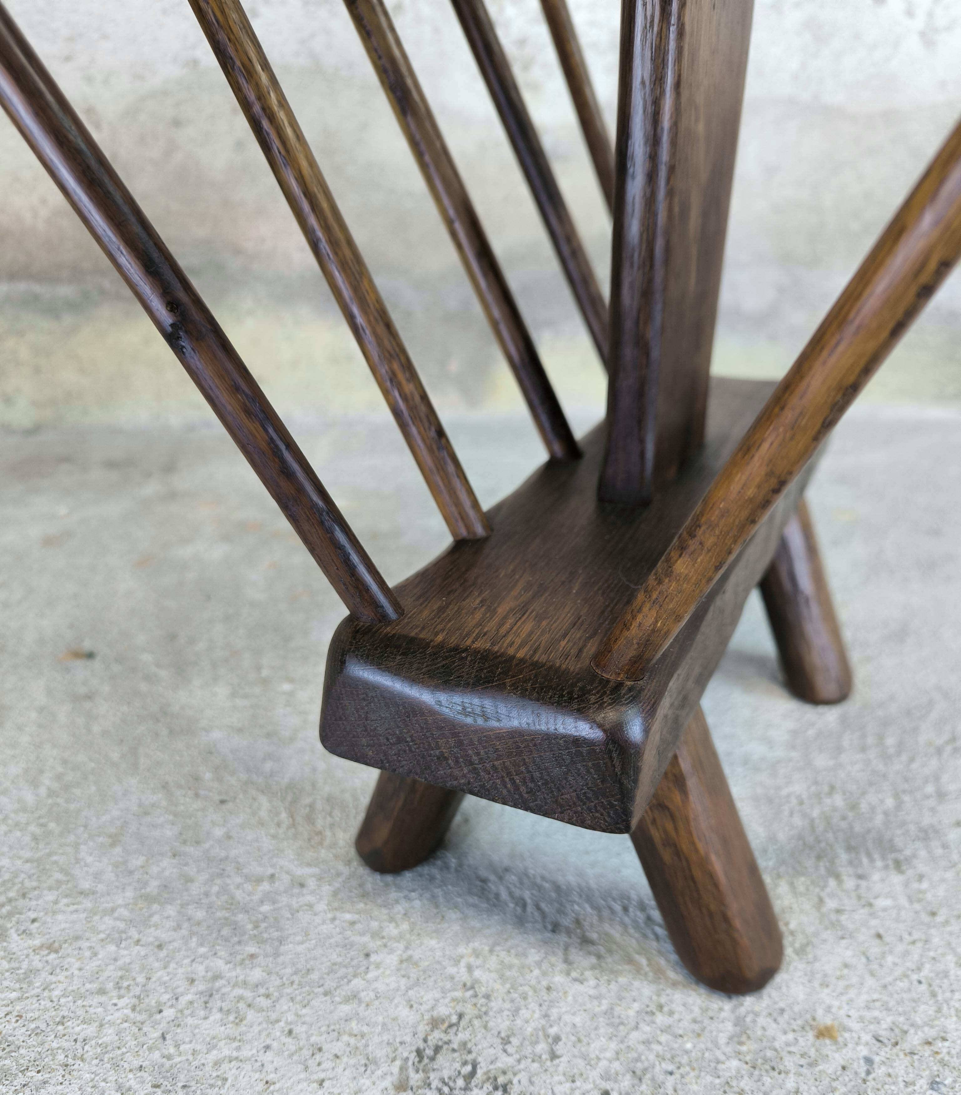 Vintage magazine rack in solid wood.