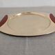 Plates and a brass and Bakelite cut by PM Italy, Italy around 1970.