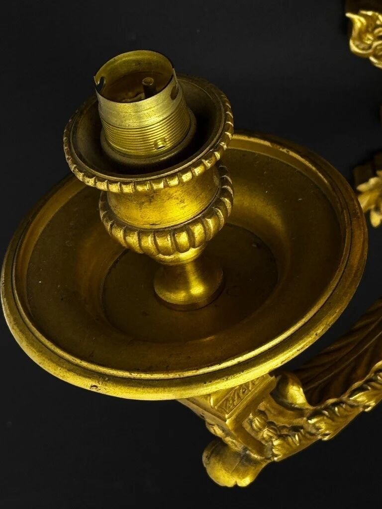 A pair of important gilt bronze wall sconces, Louis XVI style, 19th century.