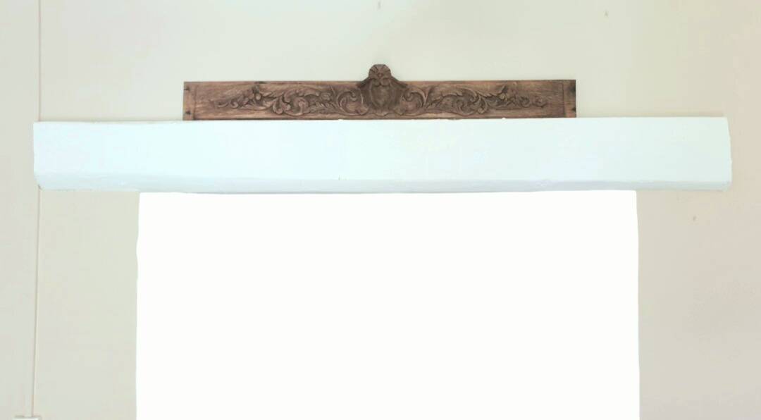 Finely carved wooden pediment