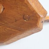 Brutalist tripod stool in carved wood, 1950s