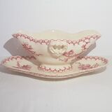 Saucière en porcelaine opaque de Gien modèle chardons, terre de fer.