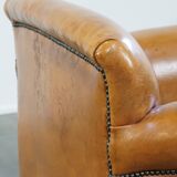 Restored antique Art Deco sheep leather armchair