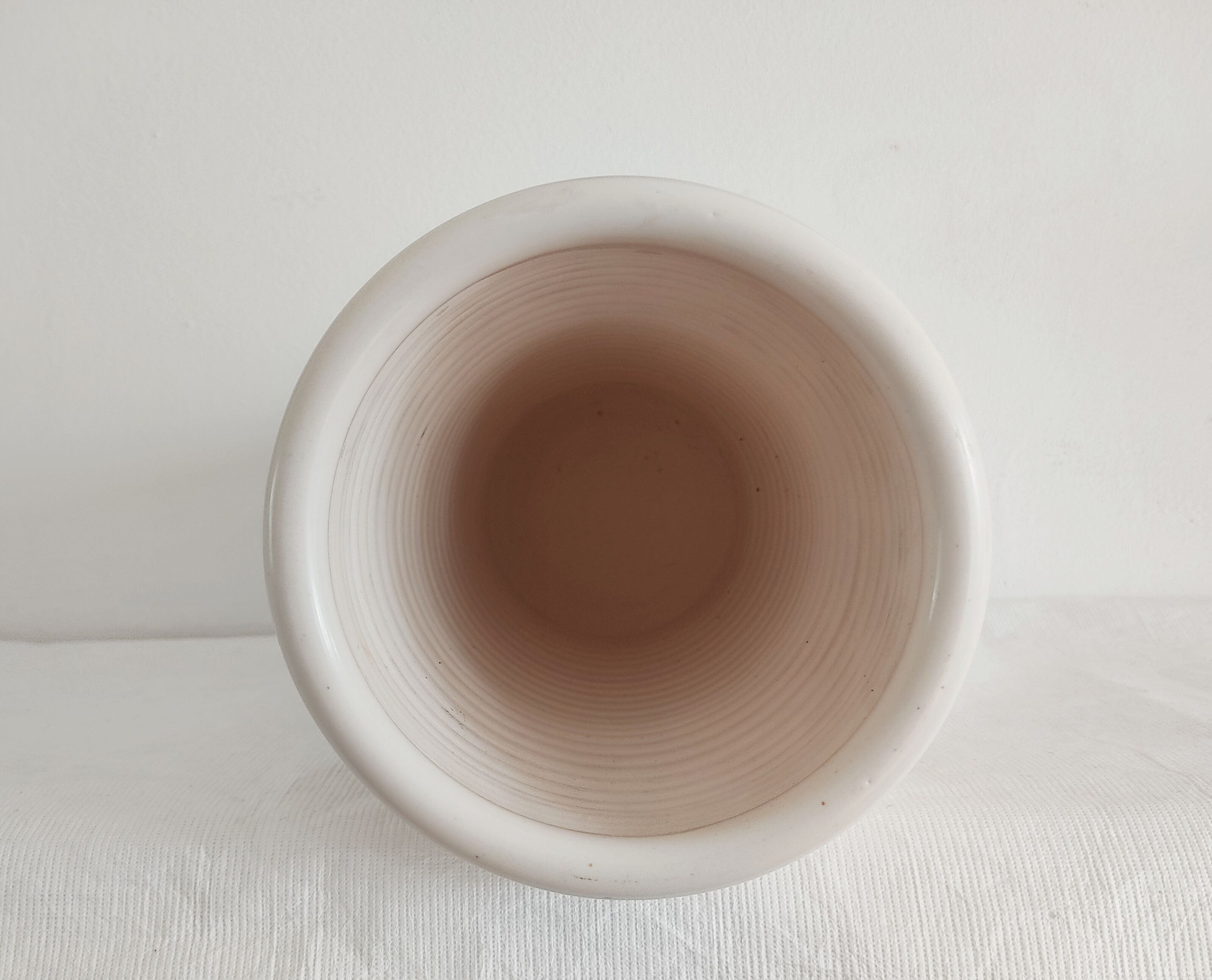 Vase decorated in hollows of bottles and glasses