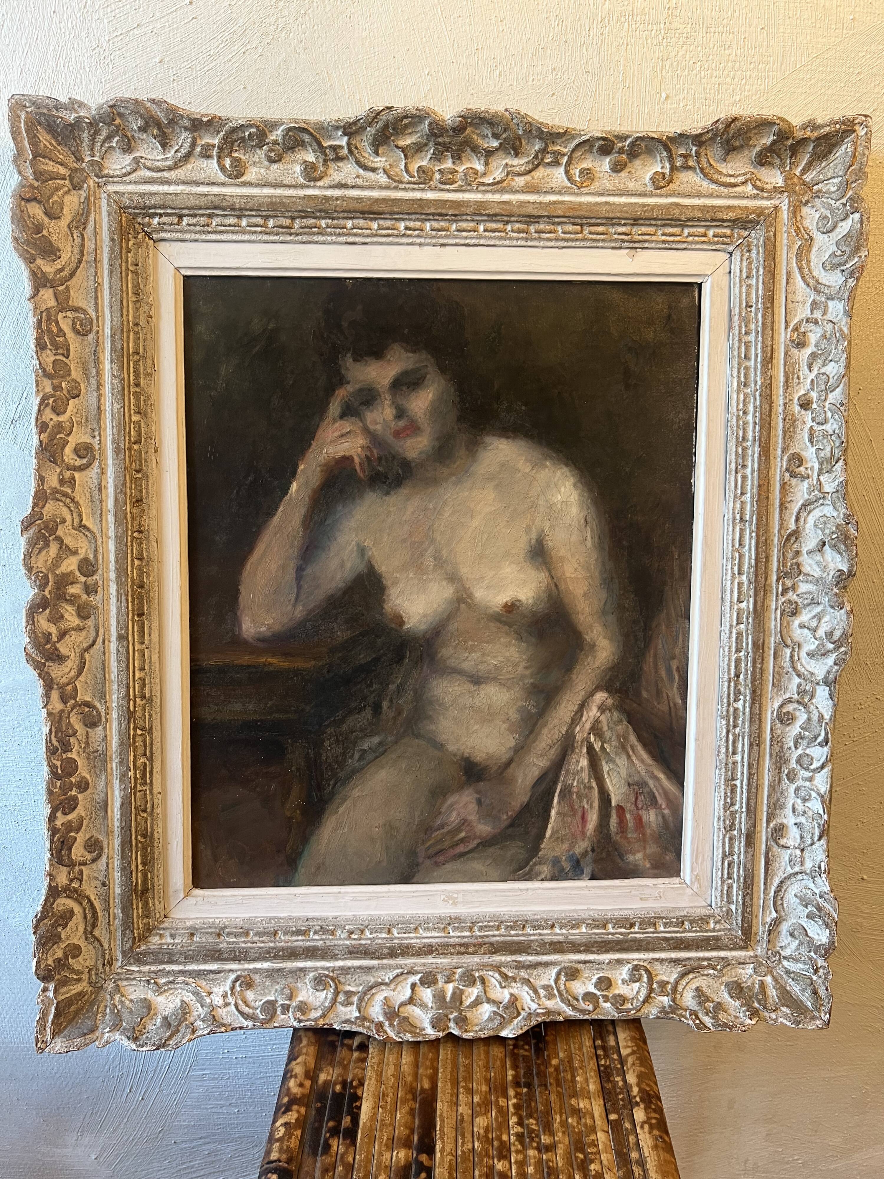 Melancholic female nude, in a sculpted baroque frame