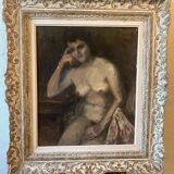 Melancholic female nude, in a sculpted baroque frame