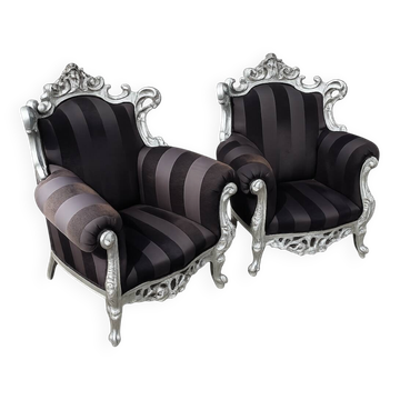 A pair of vintage armchairs, 1980s, lacquered wood and fabric