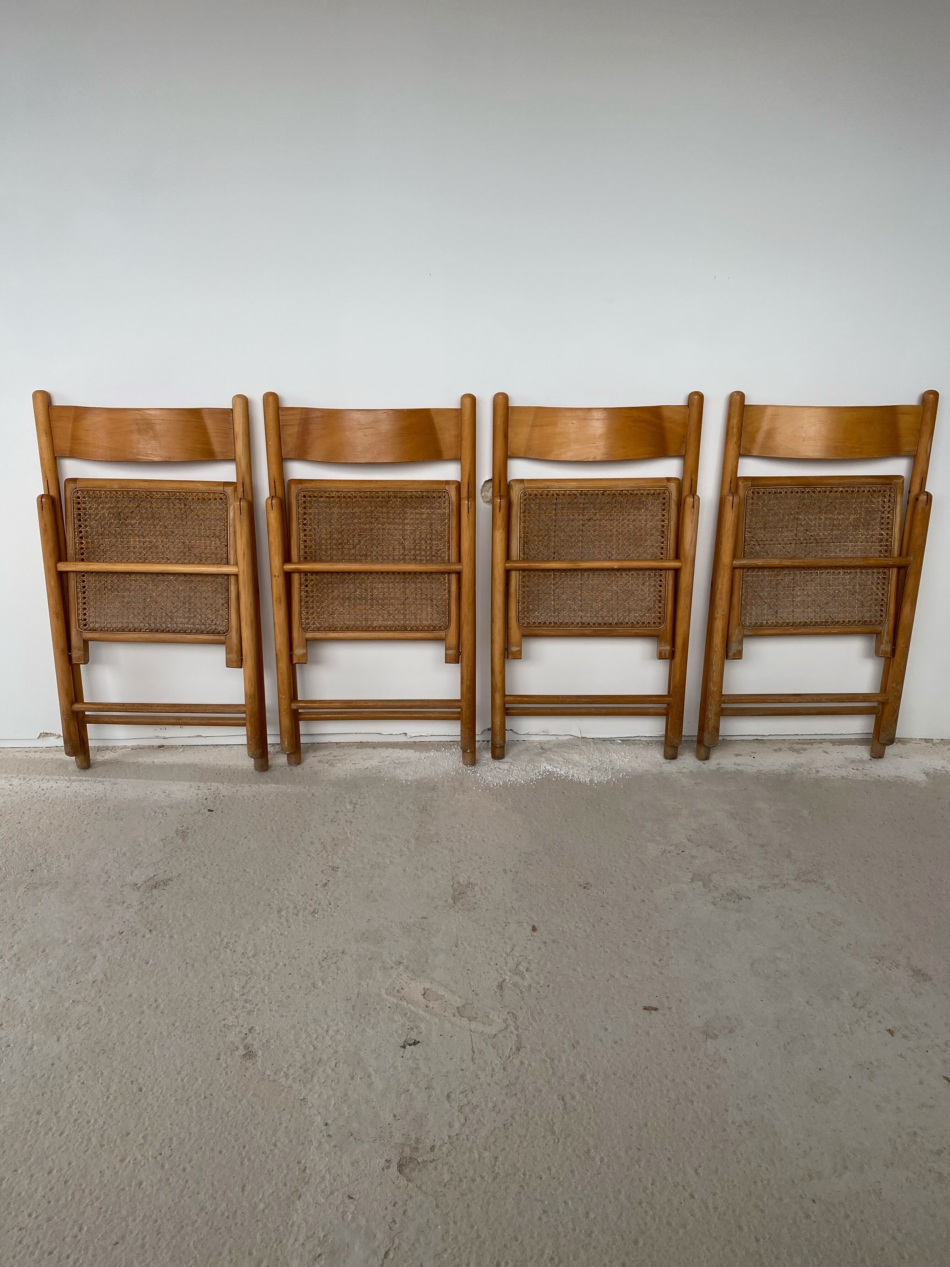 Set of 4 folding chairs, vintage design, wooden structure and canned seat. Around 1970