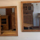 Pair of vintage antique mirrors in raw solid wood.